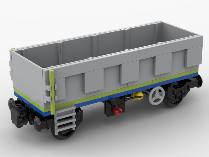 A small gray open wagon with a stripe in the colors of PKP Cargo from ...